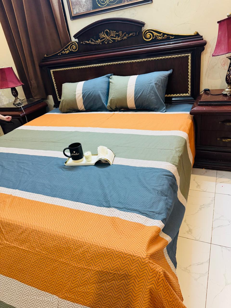 King size bedsheet with 2 pillow cases.